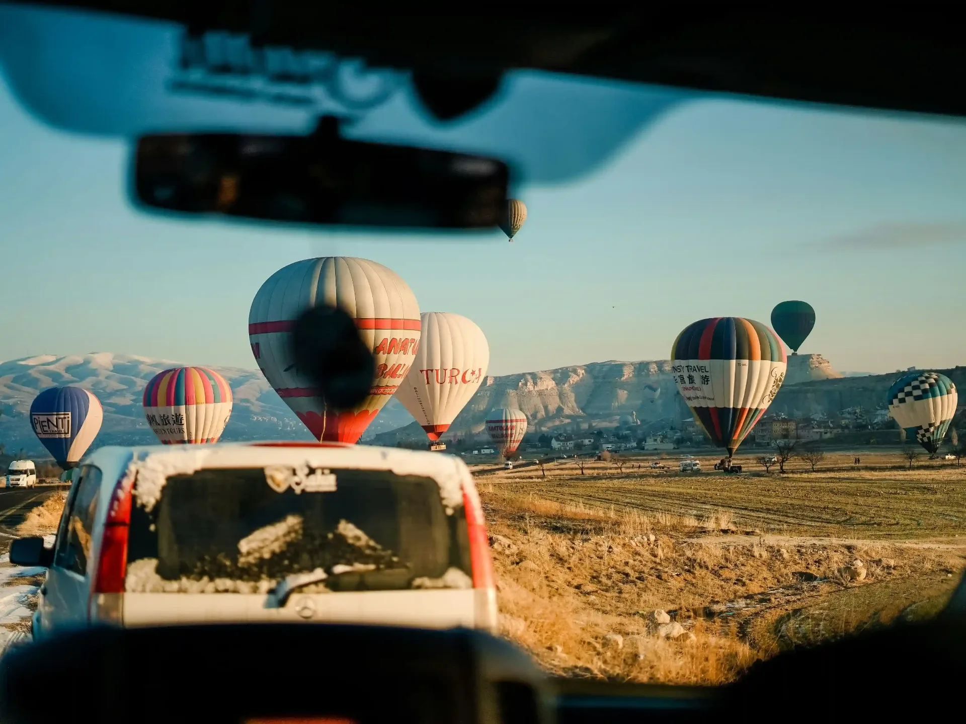 Balloons landing at sunrise