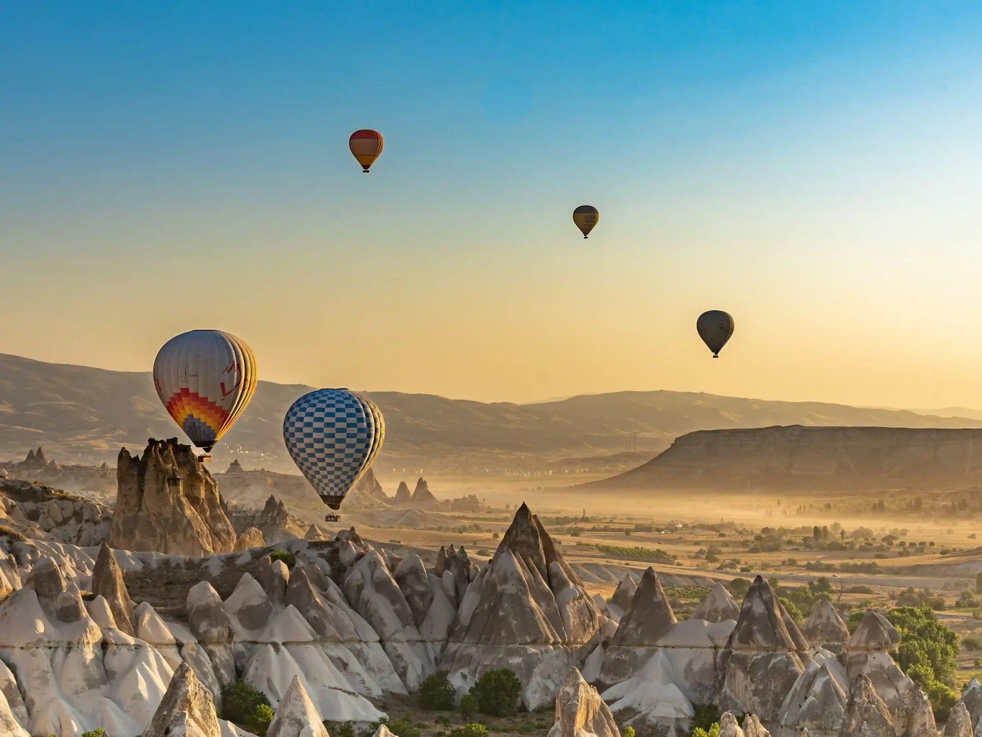 Hot air balloons over fairy chimneys